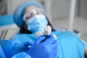 Close-up shot of a young female patient pre-surgery at a Premier Oral and Maxillofacial Surgery Group Clinic.