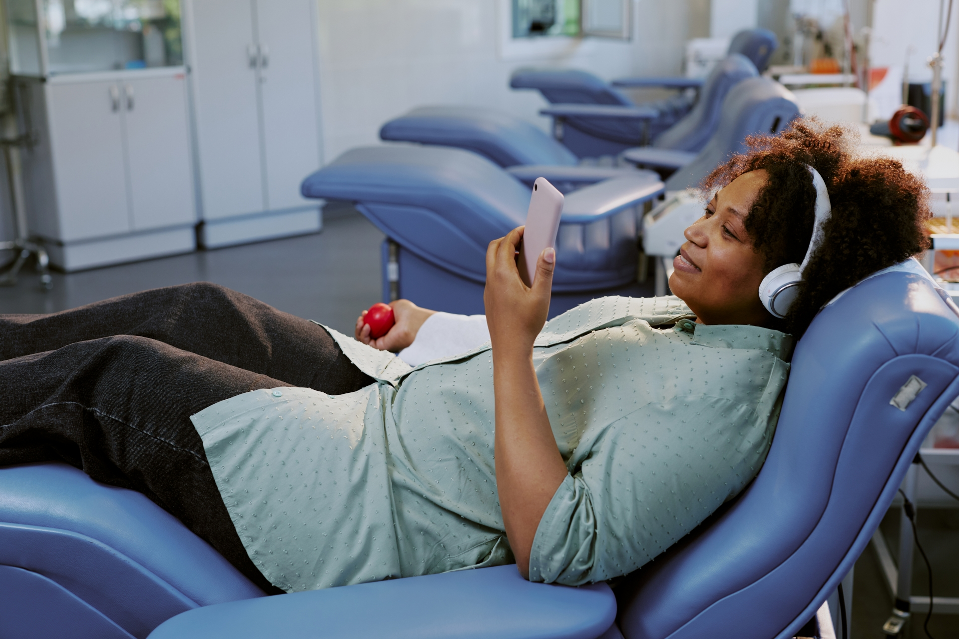 Patient relaxing comfortably before oral surgery while waiting for treatment at Premier Oral.