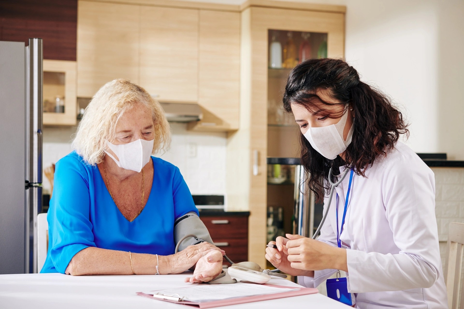 Oral surgeon discussing treatment options with a new patient at Premier Oral. 
